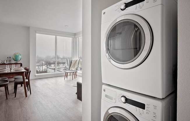 laundry with view of living room