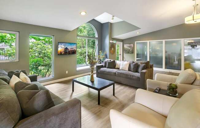 a living room with couches and a coffee table