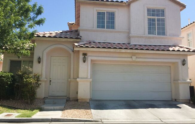 Cozy two-story property tucked into a gated community in the heart of Las Vegas.
