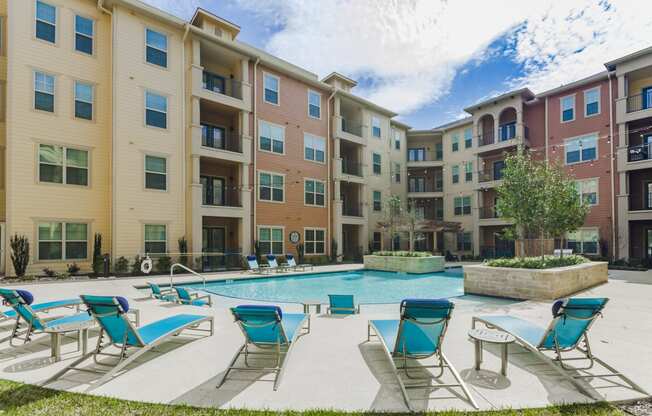 our apartments have a large pool and lounge chairs