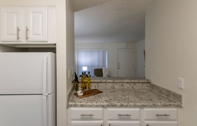 This is a photo of the kitchen in the 472 square foot 1 bedroom, 1 bath apartment at Princeton Court Apartments in the Vickery Meadow neighborhood of Dallas, Texas.