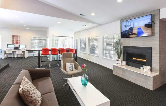 a living room with a fireplace and a television at Verona, Littleton, 80123