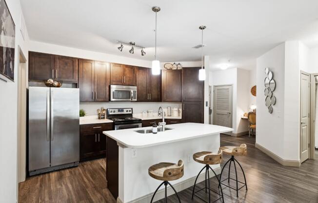 Kitchen with Large White Island at The Loree, Jacksonville, FL, 32256