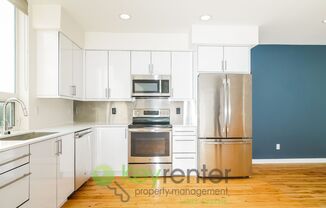 **Rent Special** Modern Two Bedroom Townhome with Designated Parking