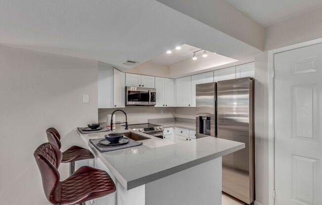 BEAUTIFUL AND SPACIOUS 1ST FLOOR MESA CONDO!