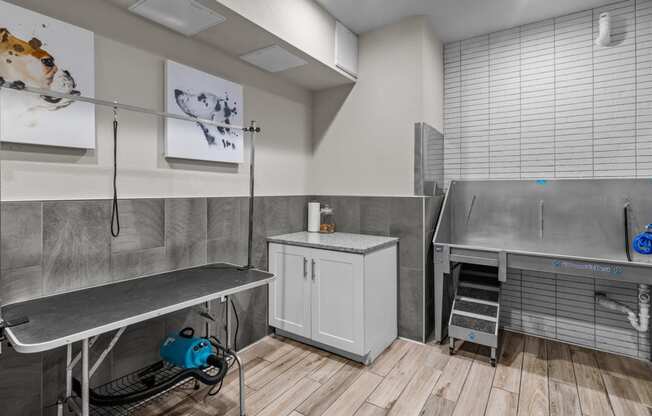 a utility room with stainless steel appliances and a sink at Alton Jefferson Park, Denver