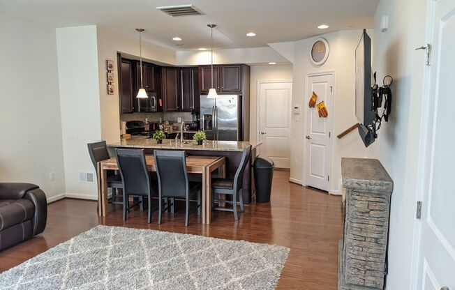 Bottom level (two story) *END UNIT* condo in the Linton Community available mid-June!