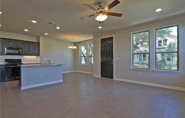 Spacious 4-Bedroom Home in Gated Lakeline Center Community!