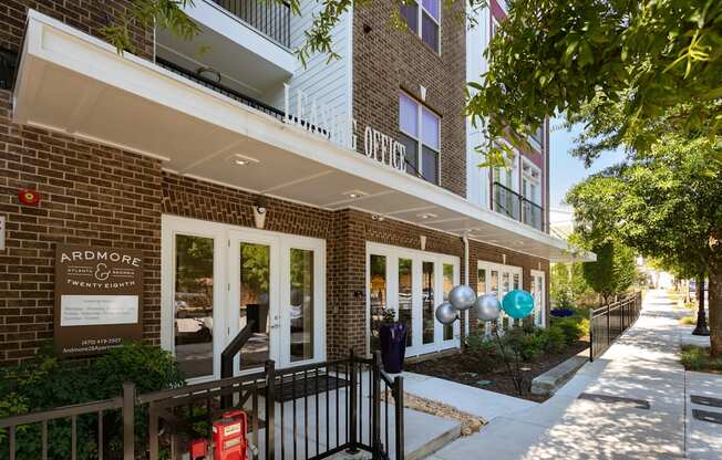 A brick building with a sign that says "Ardmore" on it.