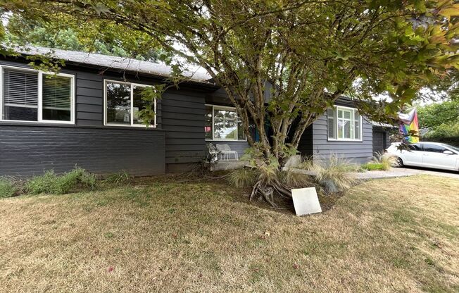Stunning Single-Level SW Portland 3-Bedroom Home with Designer Kitchen, Park-Like Backyard, EV Charger & Landscaping Included