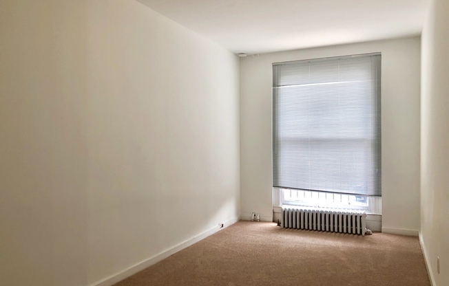 For Rent: Classic Elegance at 2504 N Calvert St – Your Timeless Urban Retreat!