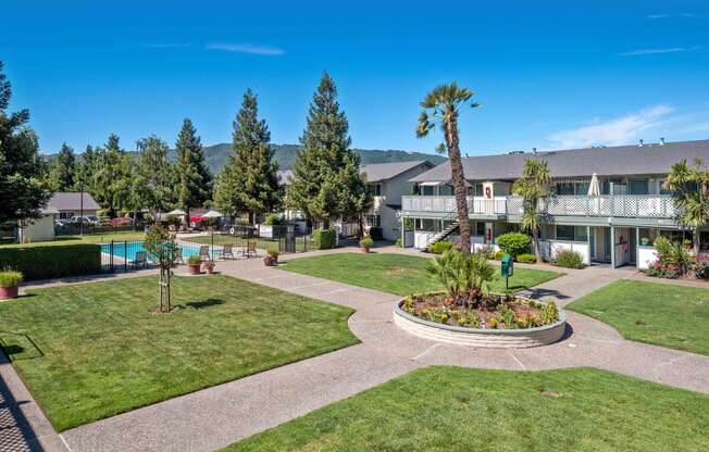 Apartments for Rent Gilroy CA - Mission Park - Spacious Grass Courtyard Next to the Pool