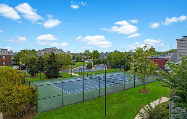 an aerial view of the tennis courts at the estates at spring valley