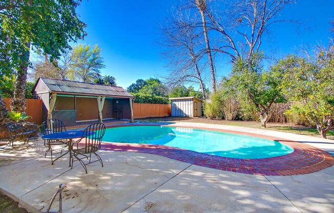 ENTERTAINER'S DELIGHT! GATED ESTATE IN SOUGHT AFTER COLLEGE ACRES!