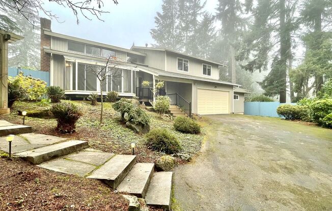 Spacious Tri-Level Home in West Lake Sammamish with Luxurious Features and Prime Location