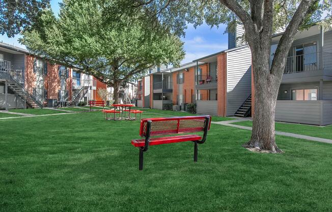 a park bench in front of a building