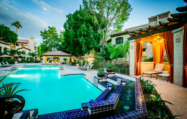 Beautiful Swimming Pool with Outdoor Seating at 1, 2, and 3 Bedroom Apartments Scottsdale AZ