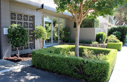 The  side view entrance to 36th aveapartments