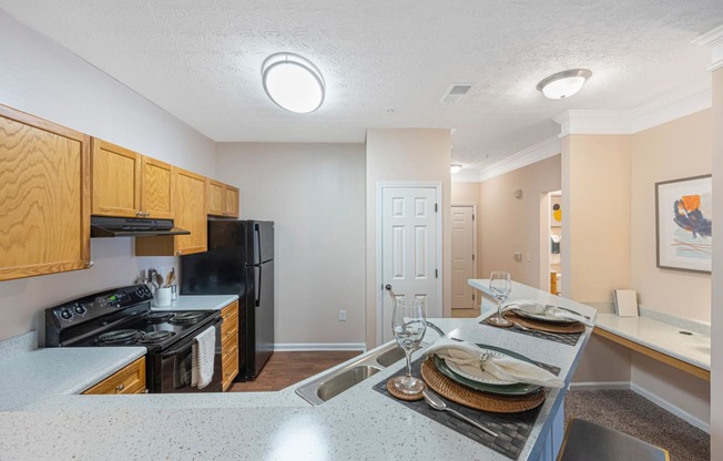 a kitchen with a counter top and a sink