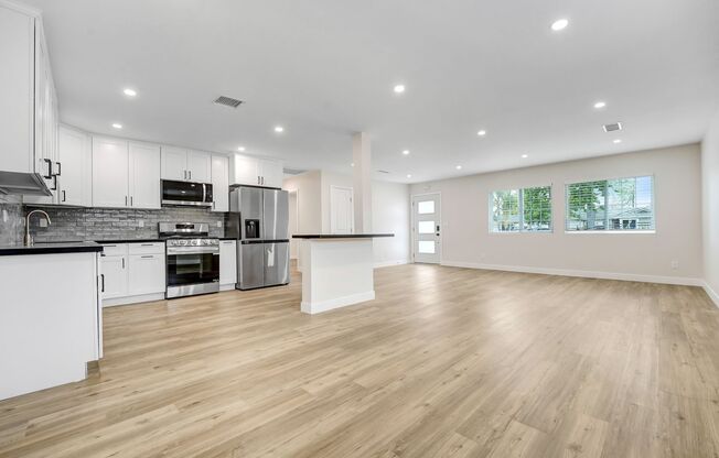Stunning 3-Bedroom + Den Lease | Brand New 2025 Build | Private Gated Yard & EV Charger