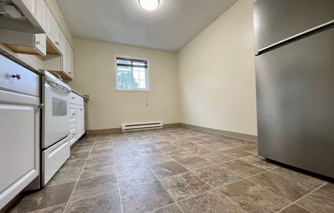 Don't Miss Out! Amazing Sunnyside Location~ Upstairs Unit, Updated Throughout~ 90 Walk Score, 98 Bike Score~ Off Street parking~ Free Laundry!