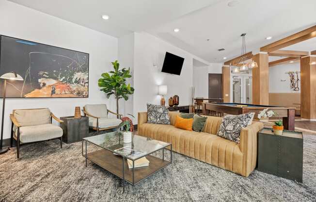 a living room with a couch and a coffee table