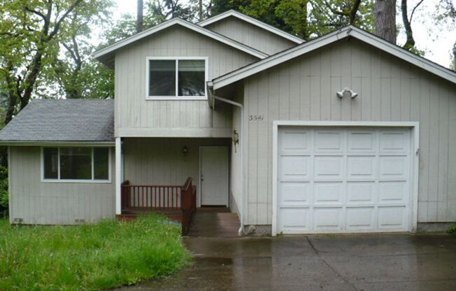 Four Bedroom w/ fenced yard, large garage