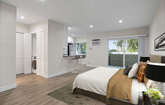 a bedroom with a bed and a desk and a window
