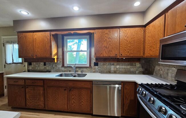 3 bedroom 2 bath with additional lower level family room in great NE location near I380