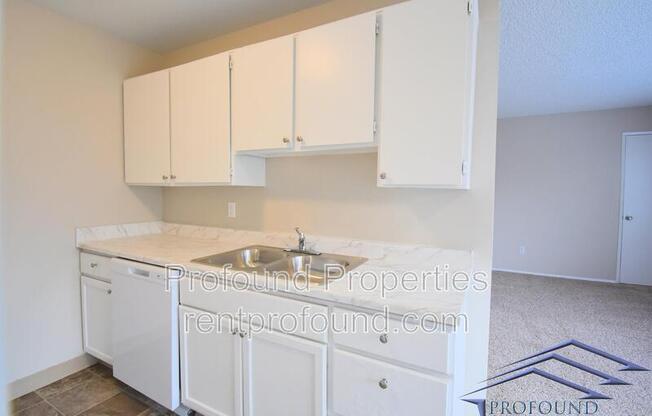702 NE 99 AVE