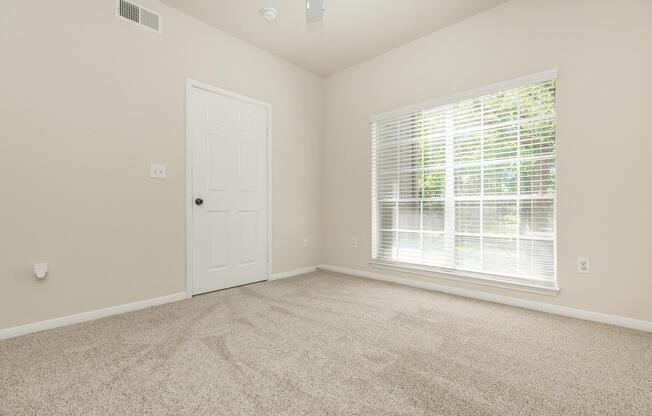 vacant carpeted bedroom