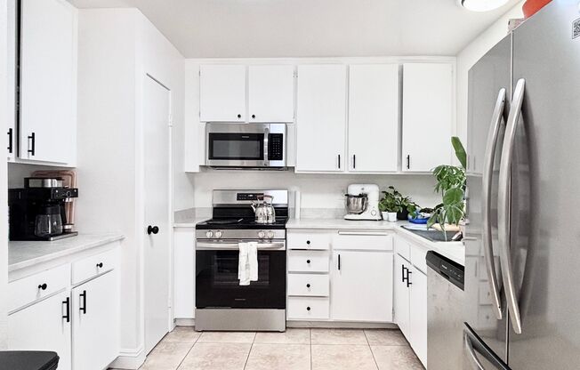 Fantastic 4 bedroom home with a 1 car garage and driveway space for additional car! Backyard and updated home!