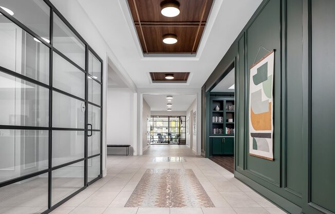 lobby hallway with spanish tile and custom woodworking
