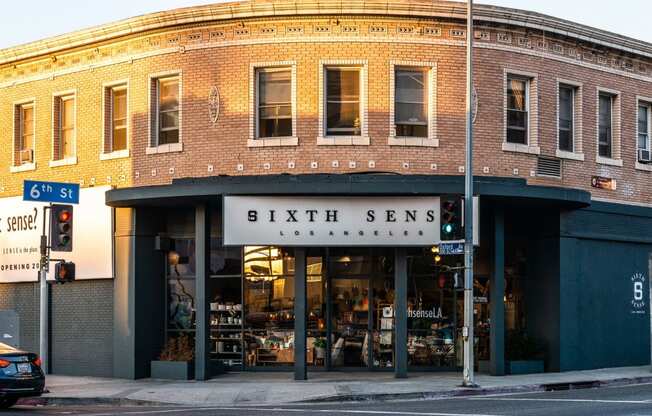 a brick building with a sign that reads 6th senses