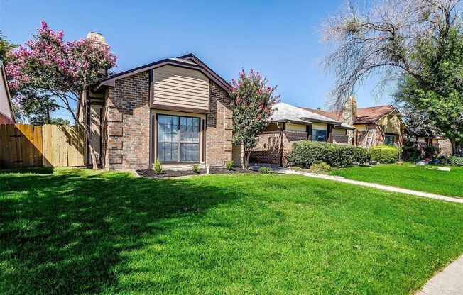 Updated 2/2 with Granite Counter Tops and Refrigerator Included!