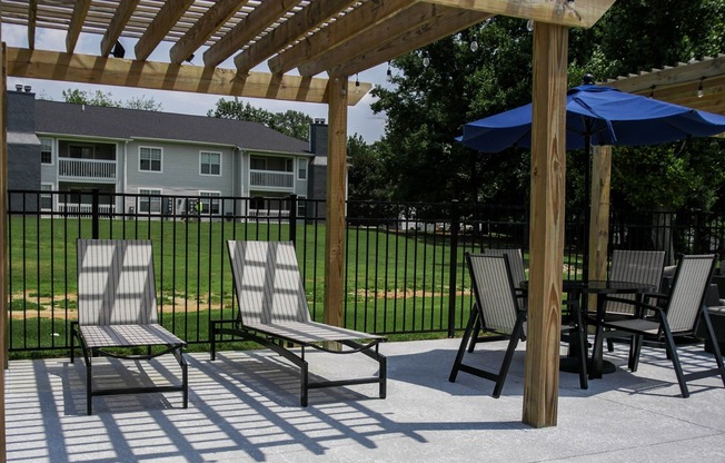 Cabana by the pool with pool chairs