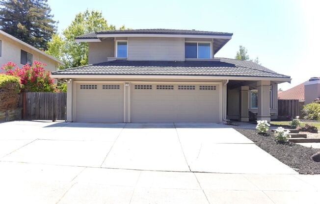 Spacious Beauty with Remodeled Kitchen and your Own Backyard Oasis!