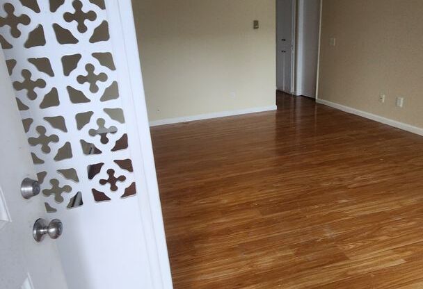 Second Floor Unit -Laminate Floors Throughout- Wall AC in Living Room