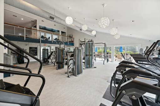 a gym with treadmills and other exercise equipment at Linkhorn Bay Apartments, Virginia Beach, VA