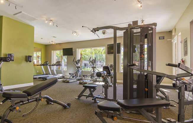 Fitness Center equipped with Weight Machines and Cardio Equipment