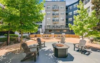 Outdoor Entertaining Space with Cozy Fireside Feature at The Atlantic Highland Park, Dallas, 75209