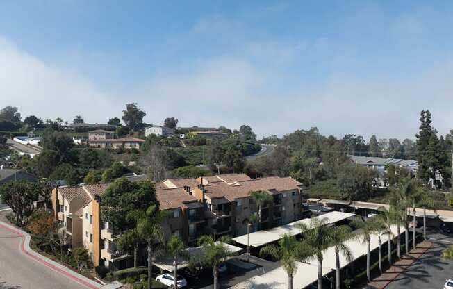 Aerial view of a neighborhood with houses and trees at Ascend2300, Carlsbad, 92008