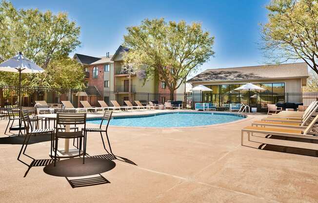 Outdoor Pool and Sundeck with Chairs