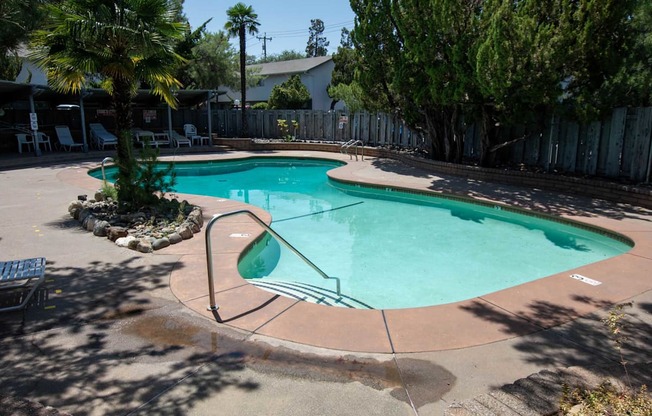 Pool at Driftwood Village with steps and handrail