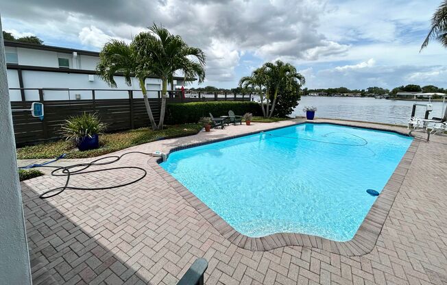 Classic waterfront Snell Isle Estates 3 Bed 2.5 Bath Home with private dock!