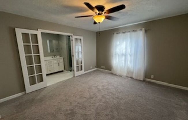 Updated Modern bathrooms, spacious bedrooms, large living , fenced yard, fridge and washer and dryer available.