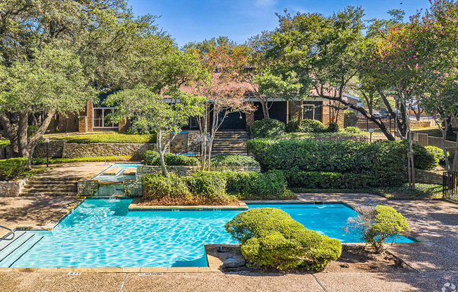 a house with a swimming pool in front of it at Sunset Canyon, San Antonio, 78232