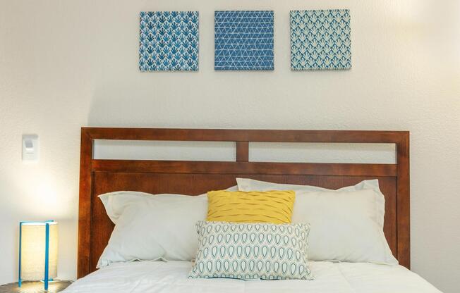 a bedroom with a large bed in a hotel room