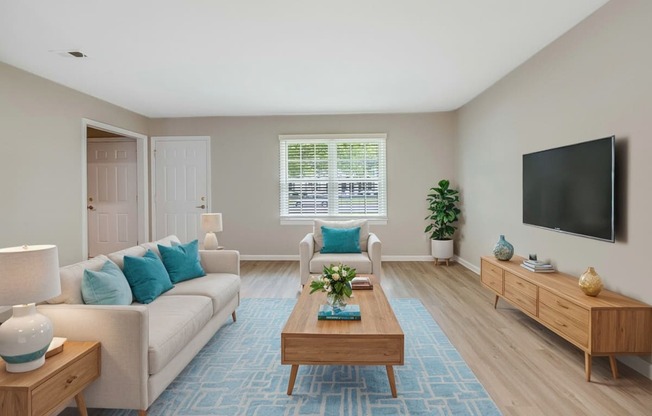 a living room with a couch and a coffee table