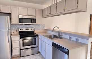 1 Bedroom Condo with In-Unit Laundry and Private Patio